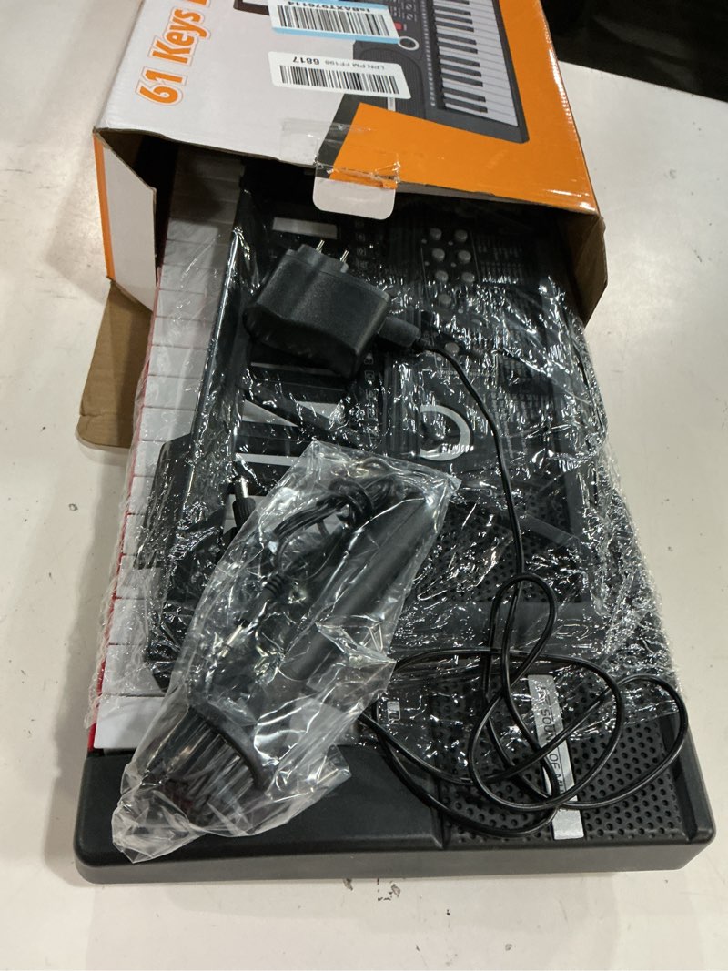 Condition photo showing Good Condition for 61 keys keyboard piano, electronic digital piano with built-in speaker microphone, sheet stand and power supply, portable piano keyboard gift teaching for beginners