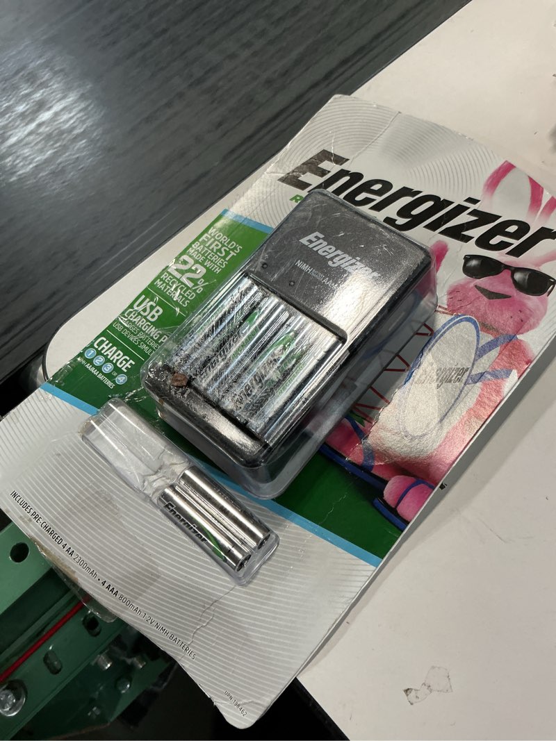 Condition photo showing As Is for energizer recharge plus usb charging port including 4 pre-charged aa and aaa batteries