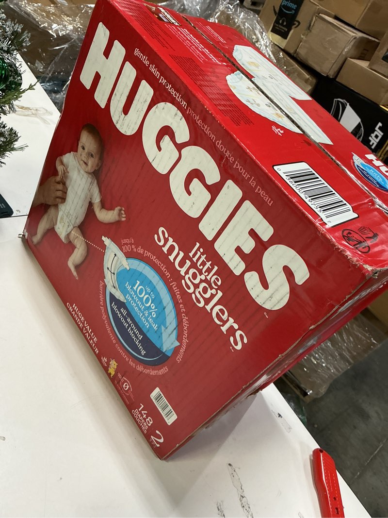 Condition photo showing New/Like New for Huggies Size 2 Diapers, Little Snugglers Baby Diapers, Size 2 (12-18 lbs), 148 Count, Packaging May Vary Size 2 148