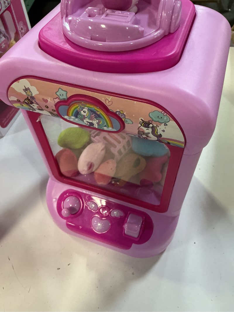 Condition photo showing Good Condition for marlrin claw machine for kids, mini vending machine girls unicorn toys, candy grabber prize dispenser with sound & 20 mini plush toys, electronic arcade game indoor toy for home party birthday gifts