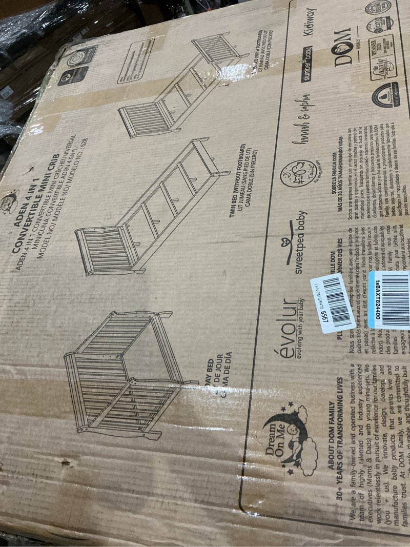 Condition photo showing New/Like New for dream on me aden 4-in-1 convertible mini baby crib in black, greenguard gold & bsa, sustainable pinewood, non-toxic finish, 3 mattress heights, converts to mini day & twin-size bed espresso