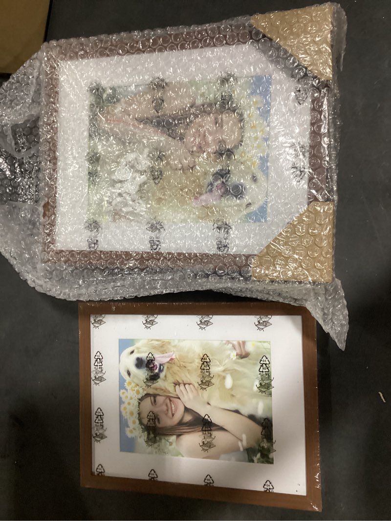 Condition photo showing New/Like New for decorUhome 8.5 by 11 Picture Frame Set of 10, Display Photos 6x8 with Mat or 8.5x11 Unmatted for Picture Frames Collage Wall Decor, Black 8.5x11 Black