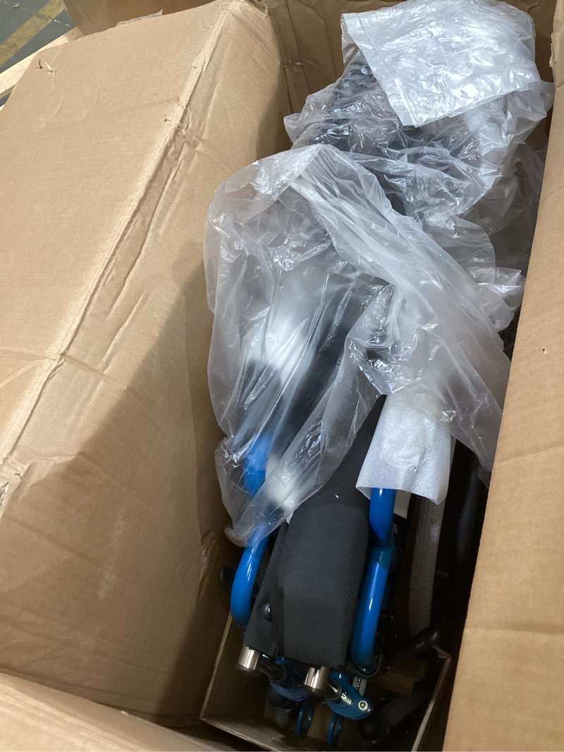Condition photo showing Good Condition for medline kidz pediatric wheelchair with 14" wide nylon seat with seat belt, 150 lb. weight capacity, telescoping handles, swing-back desk-length arms, swing-away footrests with calf straps, blue 14" wide seat
