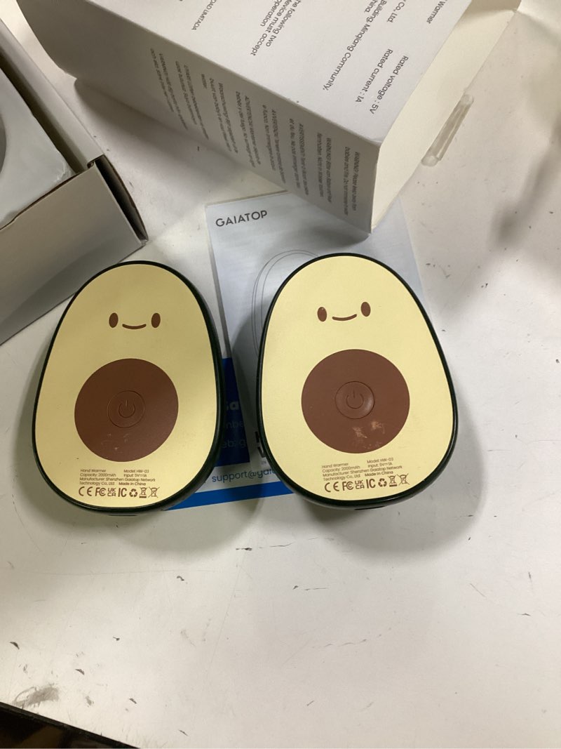 Condition photo showing As Is for Gaiatop Hand Warmers Rechargeable 2 Pack, Magnetic 3 Settings Fast Heating Avocados Shape, Electric Portable Pocket Heater, Reusable Hot Hands Gifts for Women Men Outdoor Camping Hunting Golf Smiling Face