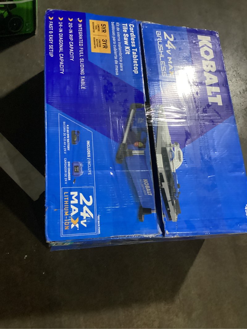 Condition photo showing As Is for similar to stock brand heavily used.. kobalt 24v 7-in -blade cordless wet tabletop sliding table tile saw ( battery included )