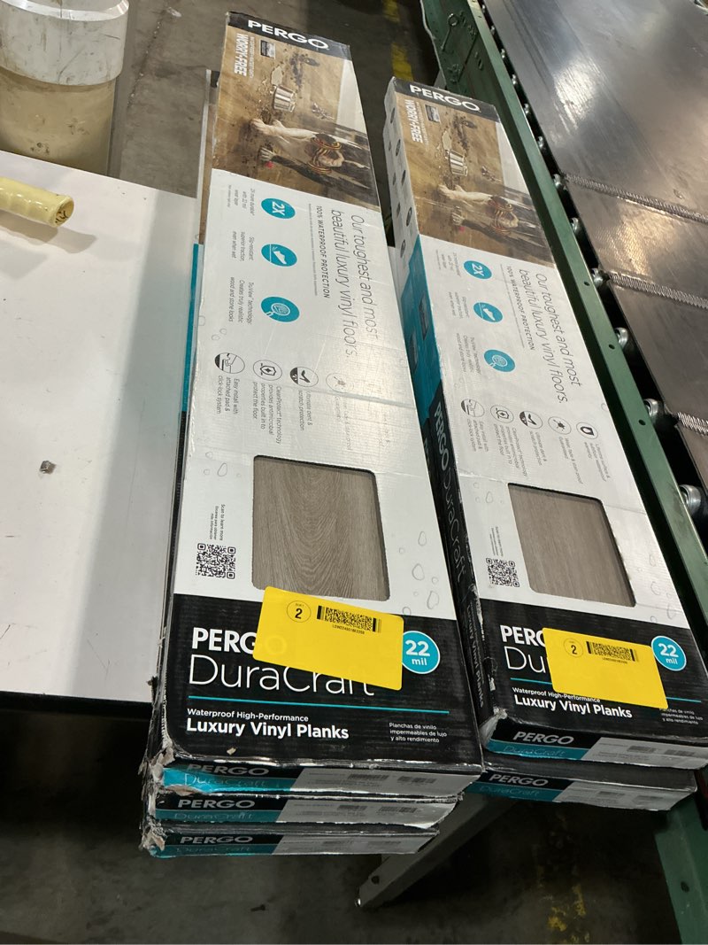 Condition photo showing New/Like New for ( 5 boxes) pergo duracraft lourdes oak gray 22-mil x 7-1/2-in w x 47-in l waterproof interlocking luxury vinyl plank flooring (17.32-sq ft/ carton)