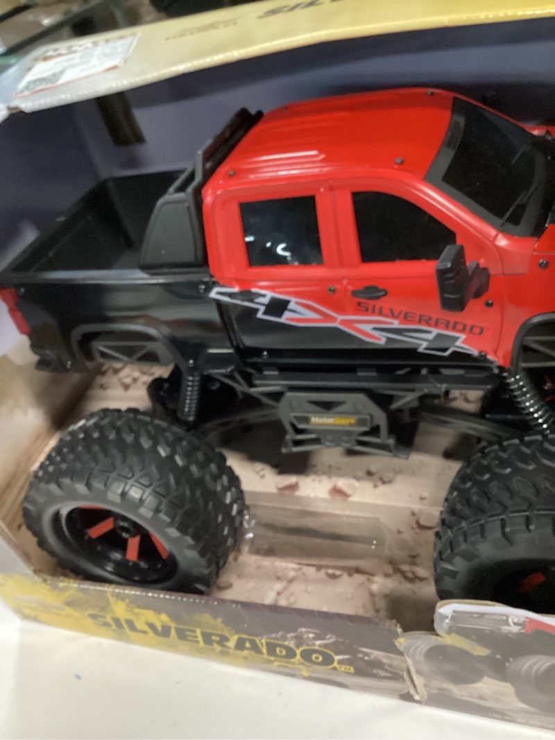 Condition photo showing Good Condition for rc 4wd heavy metal chevrolet silverado truck – 1:14 scale remote control car, stamped metal body, 2.4ghz full-function radio control, usb rechargeable, ready to run, red