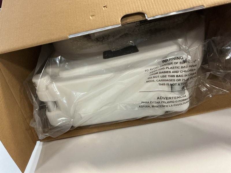 Condition photo showing New/Like New for Bath SafetyRaised Toilet Seat Product Description: Elev.Toilet Seat w/ RemArms,RTL,1 EA