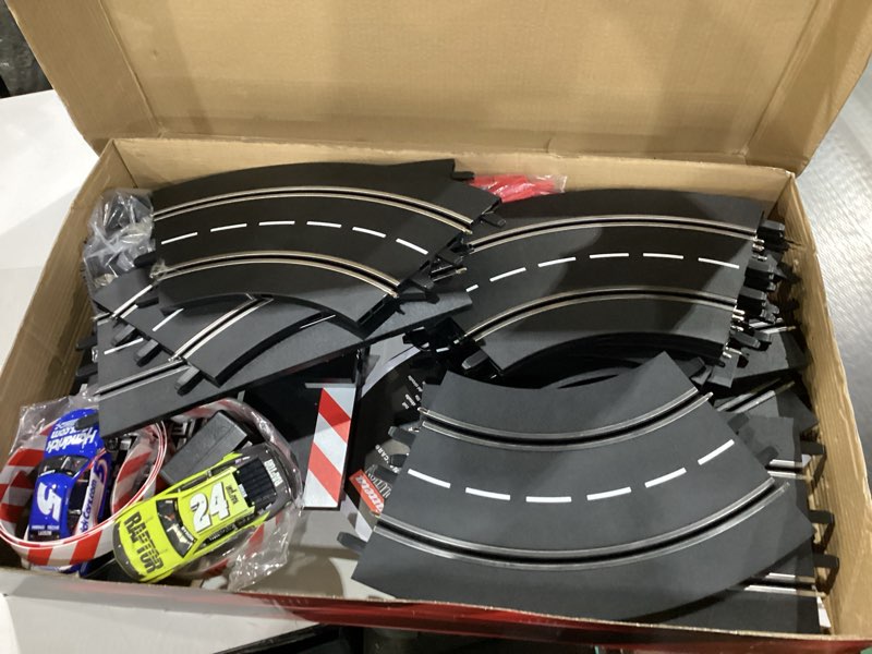 Condition photo showing As Is for Carrera Evolution 20025248 NASCAR Darlington Showdown Analog Electric 1:32 Scale Slot Car Racing Track Set - Includes Two 1:32 Scale Cars & Two Dual-Speed Controllers Ages 8+