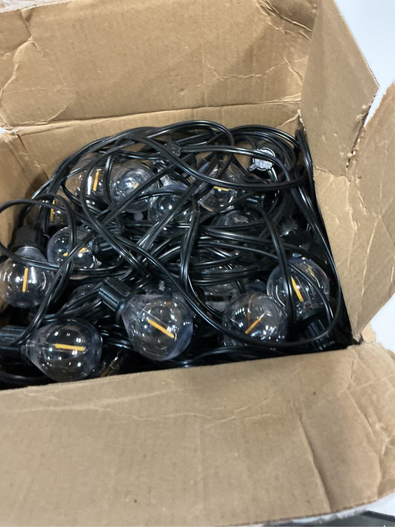 Condition photo showing As Is for addlon 100ft outdoor string lights g40 with remote, 54 led shatterproof bulbs, dimmable patio globe lights waterproof, hanging outside lighting for backyard, garden, deck, balcony, porch, café, decor 100ft(50 sockets)