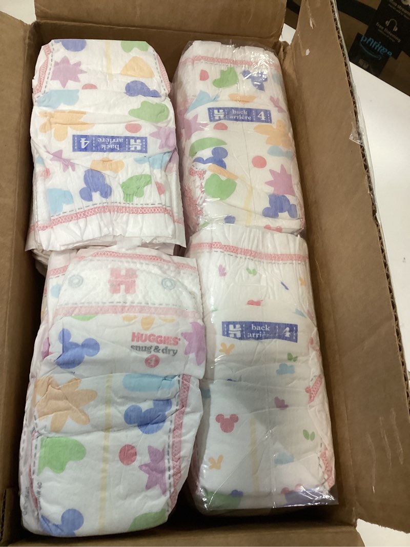 Condition photo showing Good Condition for Huggies Size 4 Diapers, Snug & Dry Baby Diapers, Size 4 (22-37 lbs), 92 Count, Packaging May Vary Size 4 92
