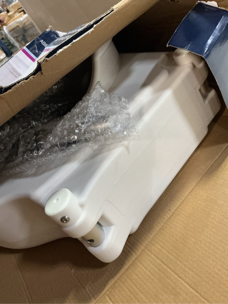 Condition photo showing As Is for bath safetyraised toilet seat product description: elev.toilet seat w/ remarms,rtl,1 ea