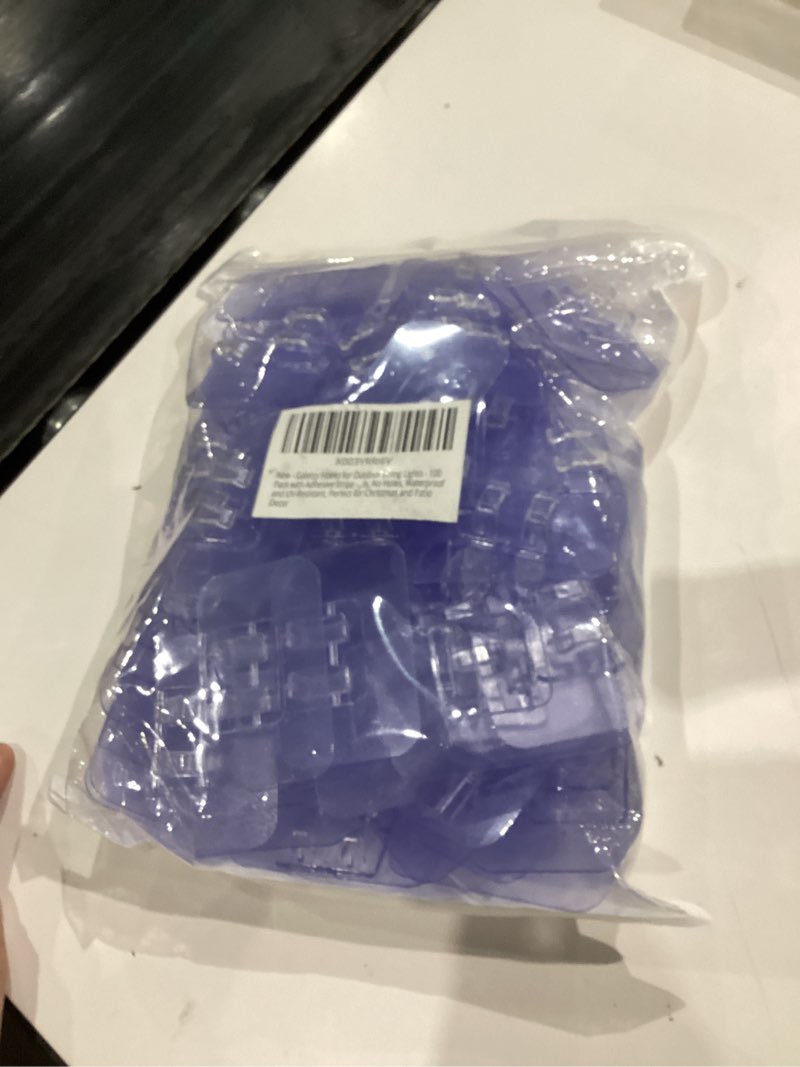 Condition photo showing Good Condition for Hooks for Outdoor String Lights - 100 Pack with Adhesive Strips - No Damage, No Tools, No Holes, Waterproof and UV-Resistant, Perfect for Christmas and Patio Decor