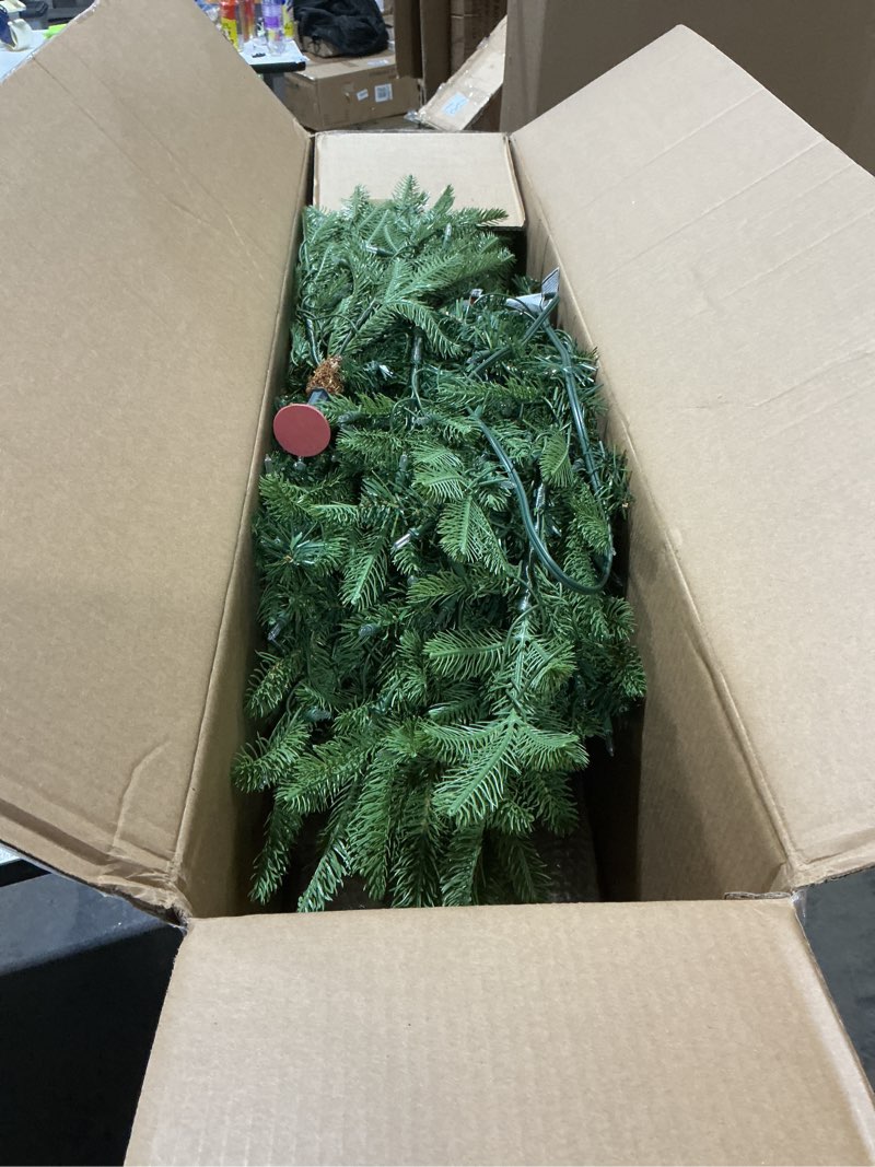 Condition photo showing Good Condition for National Tree Company 6.5 ft Pre-Lit Norwegian Spruce Artificial Christmas Tree, 650 Clear Lights, 956 Feel Real Tips, Includes Stand, Green