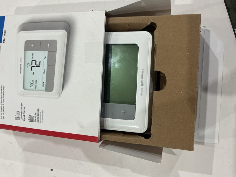 Condition photo showing As Is for honeywell home rth7560e 24-volt selectable-flexible programmable thermostat