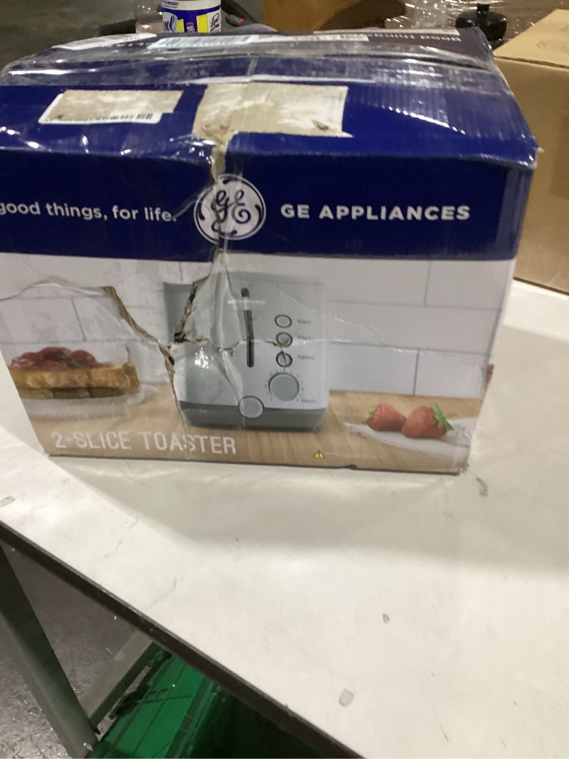 Condition photo showing New/Like New for GE 2 Slice Stainless Steel Toaster, Extra Wide Slots for Toasting Bagels, Breads, Waffles & More, 7 Adjustable Shade Settings, Removable Crumb Tray, Countertop Kitchen Essentials, 850 Watts 2-Slice Stainless Steel