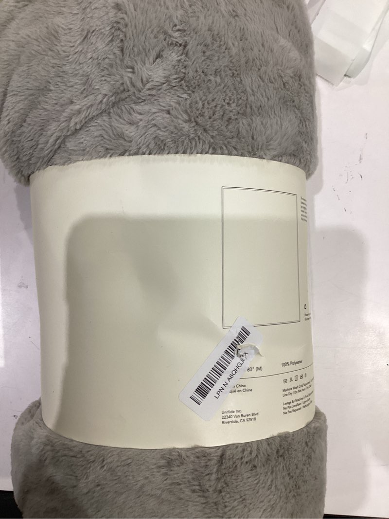 Condition photo showing As Is for unhide lil’ marsh faux fur blanket - lightweight, soft throw blanket - machine washable - ideal for bed, couch, or reading chair- medium (60" x 80") greige greige medium (60" x 80")