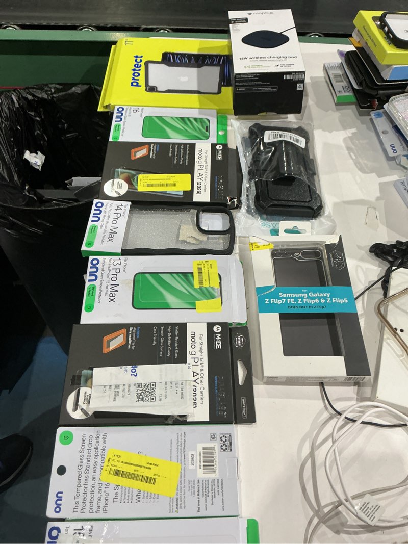 Condition photo showing As Is for assorted cellphone/tablet/laptop case covers & accessories