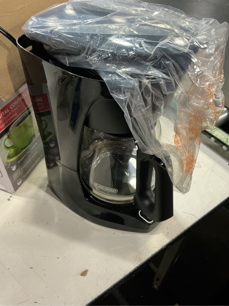 Condition photo showing New/Like New for black+decker 12-cup digital coffee maker, programmable, washable basket filter, sneak-a-cup, auto brew, water window, keep hot plate, black