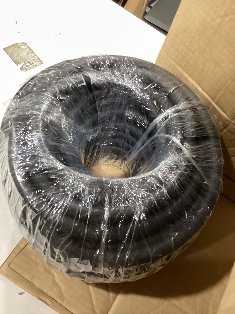 Condition photo showing Good Condition for flexible cord, 100 foot long, black