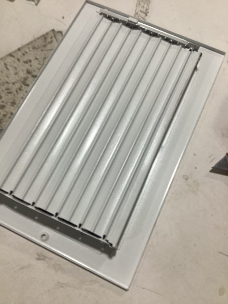 Condition photo showing Good Condition for reliabilt 10-in x 6-in 2-way aluminum white sidewall/ceiling register