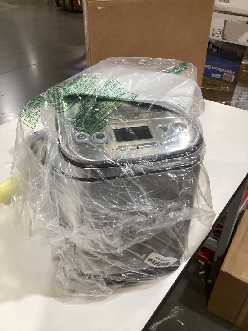 Condition photo showing As Is for Cuisinart Bread Maker Machine, Stainless Steel Automatic Bread Machine with 12 Menu Options, 3 Loaf Sizes up to 2 Lb., 3 Crust Colors, Removable Nonstick Baking Pan & Kneading Paddle, CBK-110NAS Compact Machine