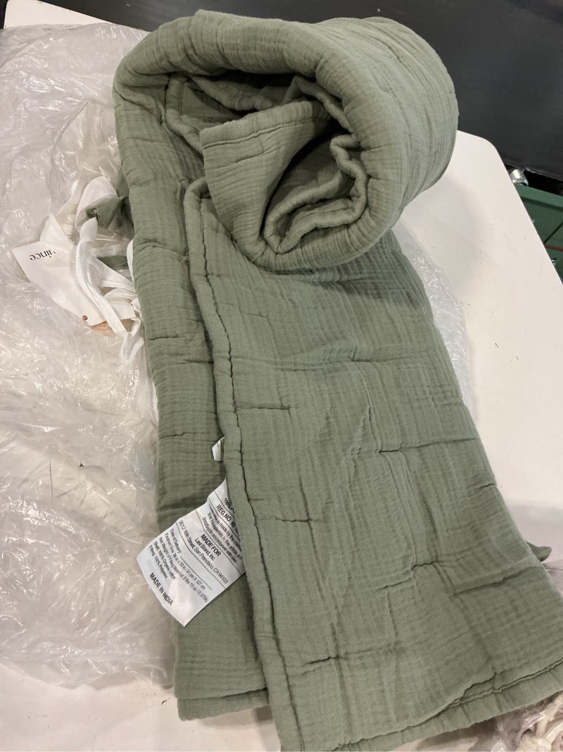 Condition photo showing As Is for quince organic cotton gauze toddler quilt, one size, dried sage,1 piece