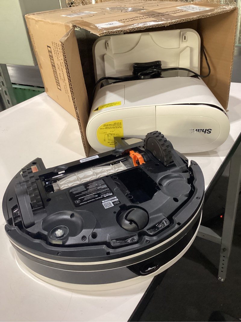 Condition photo showing As Is for MISSING BRUSH Shark Navigator Robot Vacuum with Bagless 30-Day Capacity Self-Empty Base, Powerful Suction, SmartPath Navigation, Self-Cleaning Brushroll, for Carpets & Hard Floors, White, AV2110S SmartPath Navigator w/ Auto-Empty(White)