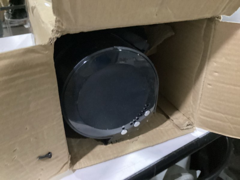 Condition photo showing As Is for vornado 143 whole room air circulator tower fan with timer and remote control, 29", black 143 – 29" tower fan