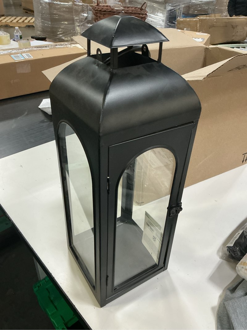 Condition photo showing As Is for better homes & gardens 18" black metal candle holder lantern, medium