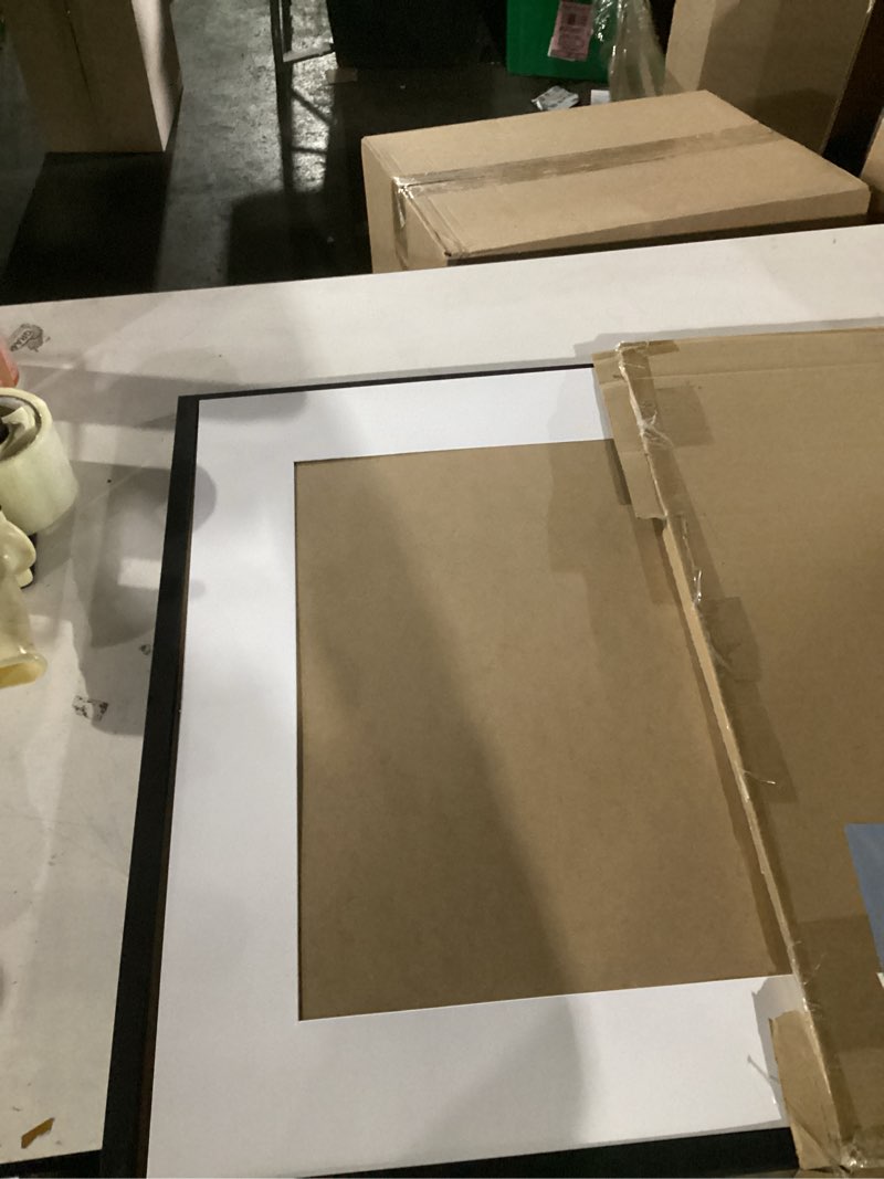 Condition photo showing Good Condition for upsimples 24x30 puzzle frame, display pictures 18x24 with mat or 24 x 30 without, wall hanging poster frames, black, 1 pack black 24x30