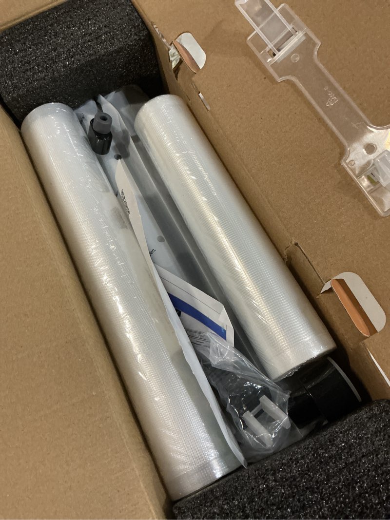 Condition photo showing New/Like New for vacuum sealer machine with airlock proseal system, 10-in-1 vacuum sealer for food, dry & moist modes, compact design with digital timer, built-in cutter & roll storage, stainless steel