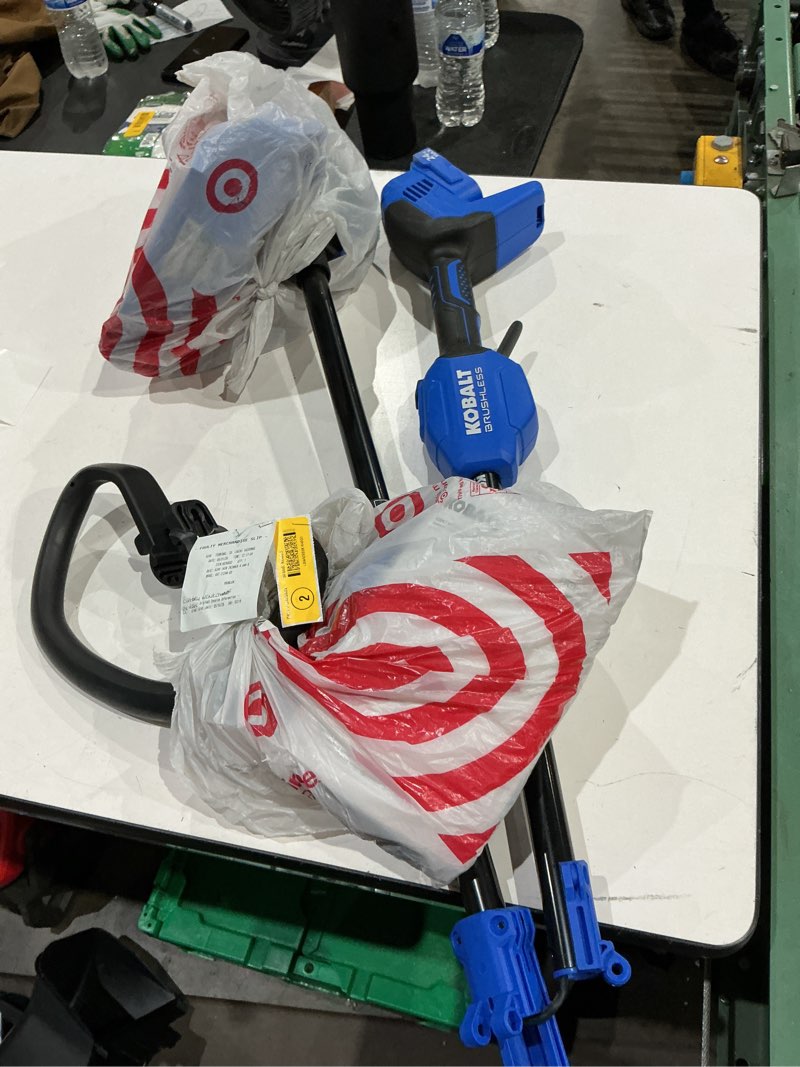 Condition photo showing As Is for kobalt quiet tech 24-volt 15-in straight shaft battery string trimmer 4 ah