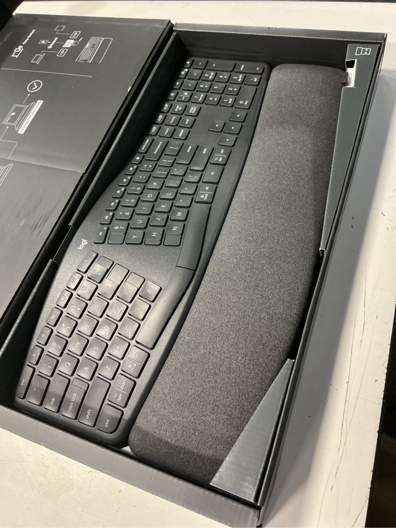Condition photo showing New/Like New for logitech ergo k860 wireless ergonomic keyboard - split keyboard, wrist rest, natural typing, stain-resistant fabric, bluetooth and usb connectivity, compatible with windows/mac, black keyboard only