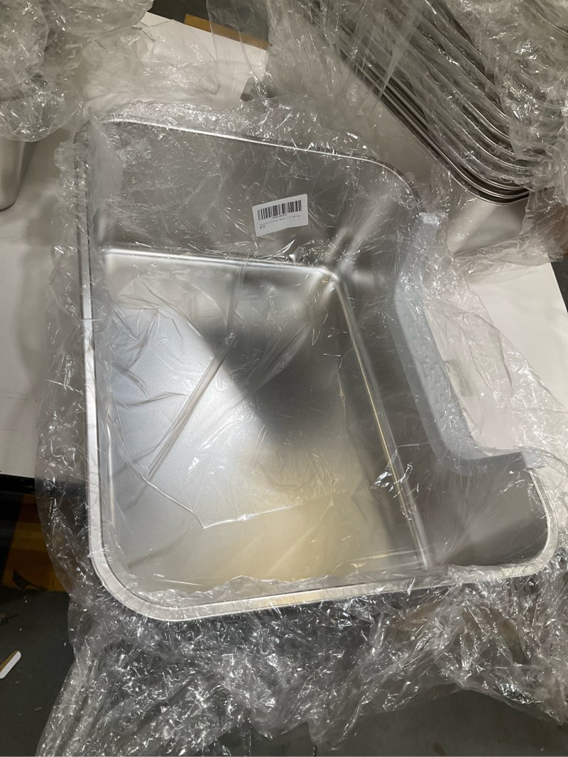 Condition photo showing New/Like New for stainless steel cat litter box, steel litter pan with curved low entry, leak proof 6 inch high side for urine, easy entry for kittens older cats, no slip, 17.7" x 13.8" x 6", silver silver 17.7" x 13.8" x 6"