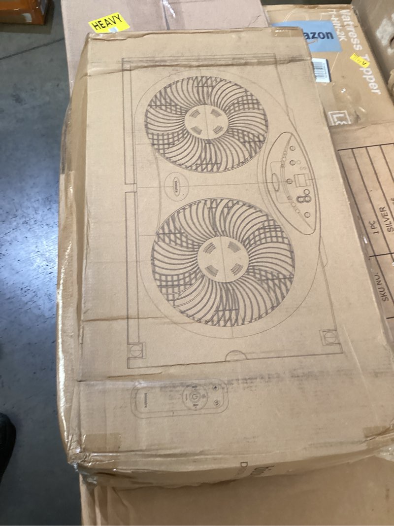 Condition photo showing As Is for bionaire window fan with reversible airflow blades – 3-speed settings, programmable thermostat, led display, remote control, fits 24–36" windows, no assembly required white 2 blades electronic control with lcd screen window fan