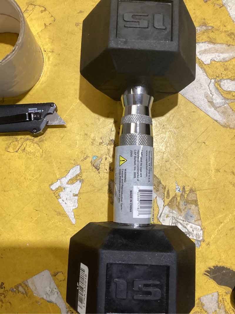 Condition photo showing As Is for cap barbell, 15lb rubber hex dumbbell, single