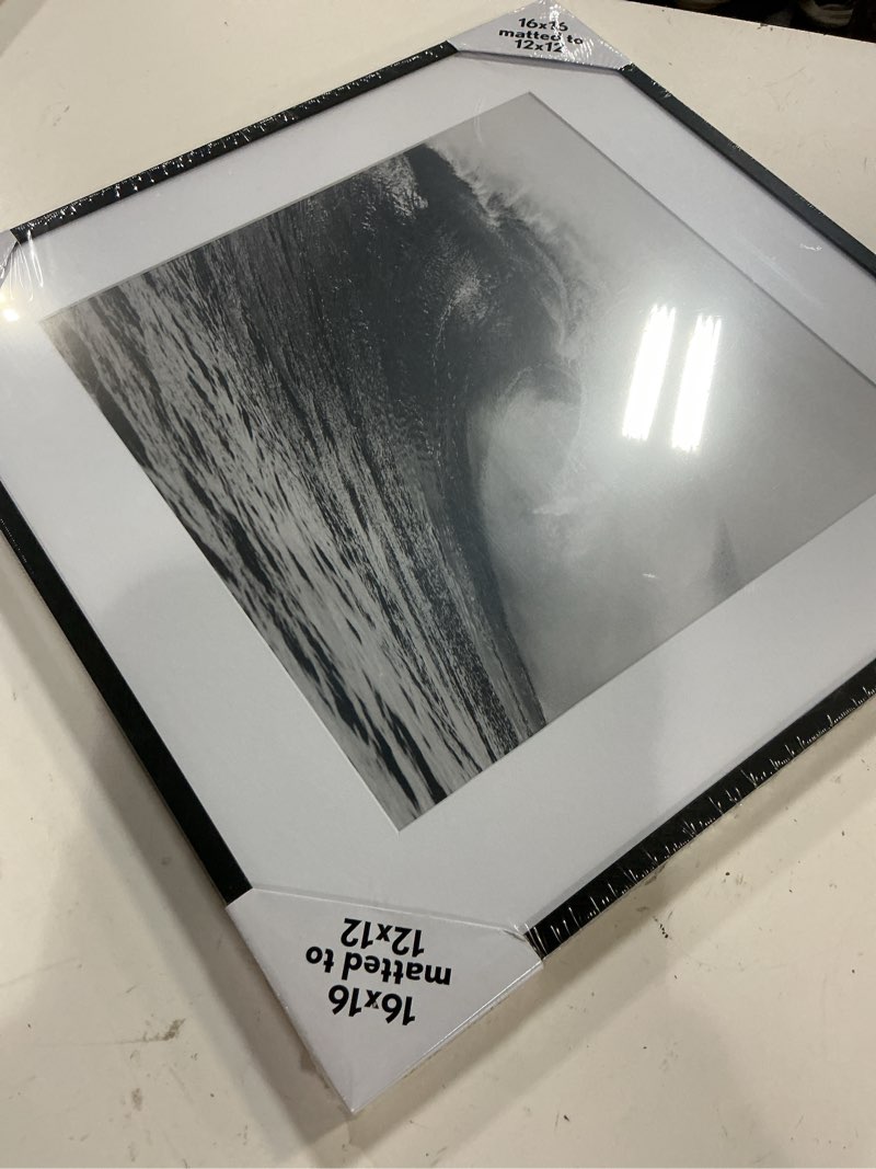 Condition photo showing New/Like New for 16" x 16" matted to 12" x 12" elevated aluminum poster frame black - threshold™: modern wall decor, metal square display