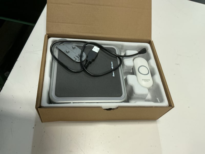 Condition photo showing As Is for honeywell home rdwl917ax2000/e doorbell portable wireless doorbell & push button-9 series, blue,grey portable wireless doorbell with push button halo light