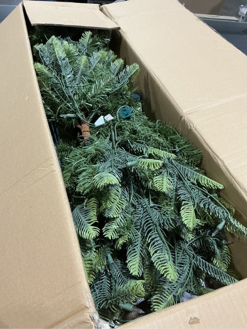 Condition photo showing Good Condition for Puleo International 6.5ft Pre-Lit Slim Aspen Fir Artificial Christmas Tree with 350 Clear Lights, 760 Realistic Dense Branch Tips, Easy Setup Artificial Trees with Sturdy Metal Stand 6.5' Slim Aspen Fir with 350 Clear Lights