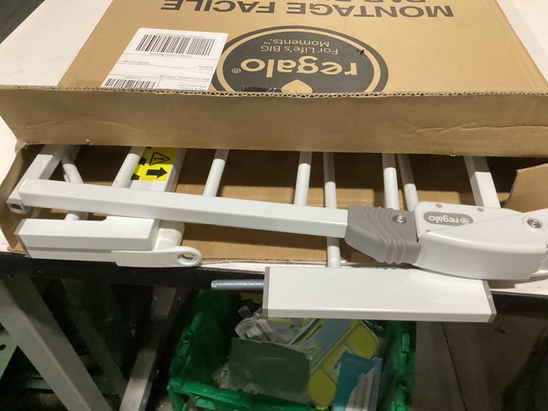 Condition photo showing As Is for regalo safety 38" baby gate for doorways & bottom of stairs, pressure mount design for babies, toddlers & pets, tested & safe for 30 years, american designed, american owned, white white 29-38.5"w x 30"h