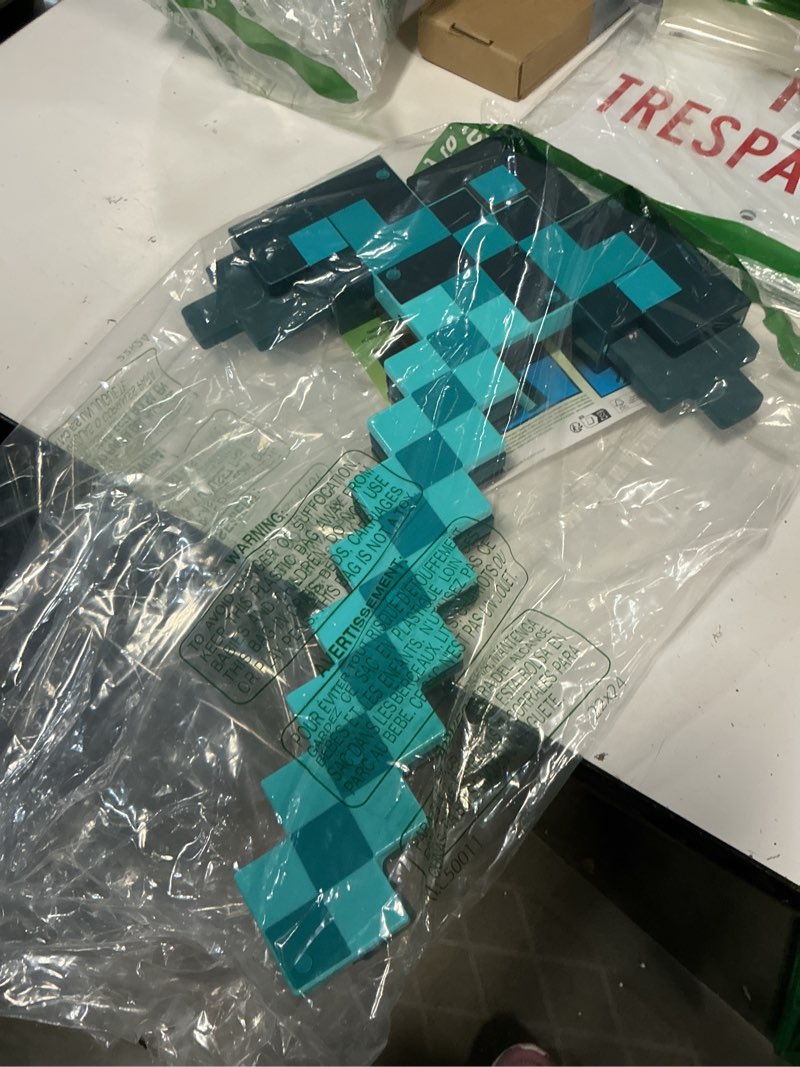 Condition photo showing As Is for Mattel Minecraft Transforming Diamond Sword & Pick-Axe Kid-Sized 2-in-1 Toy Accessory for Role-Play & Costumes