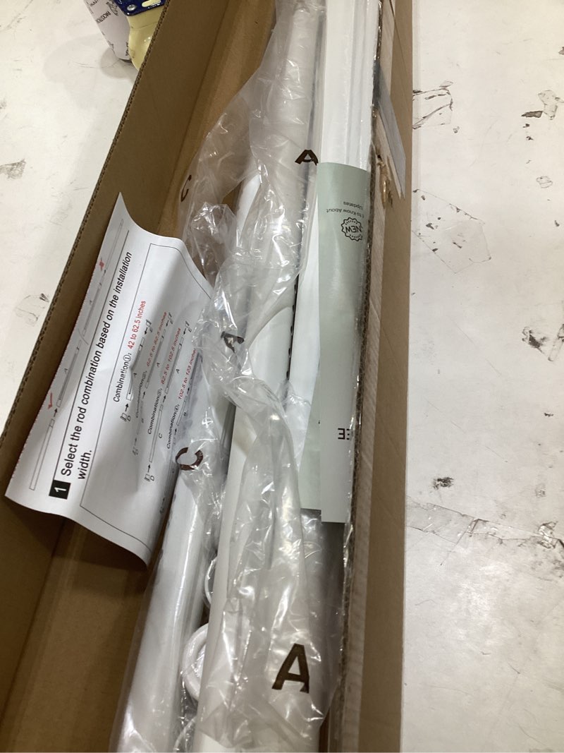 Condition photo showing Good Condition for this appears to be a curtain rod or a similar home fixture component that requires assembly.