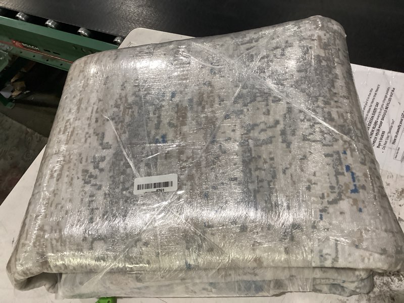 Condition photo showing As Is for large multicolored area rug