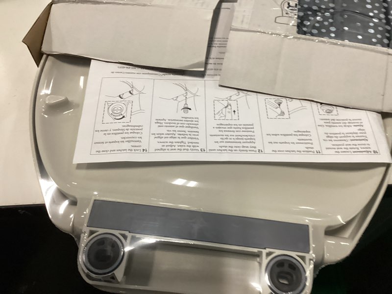 Condition photo showing Good Condition for kohler k-26801-ny impro readylatch quiet close elongated toilet seat, dune, grip-tight hardware, quiet-close lid prevents slamming dune elongated