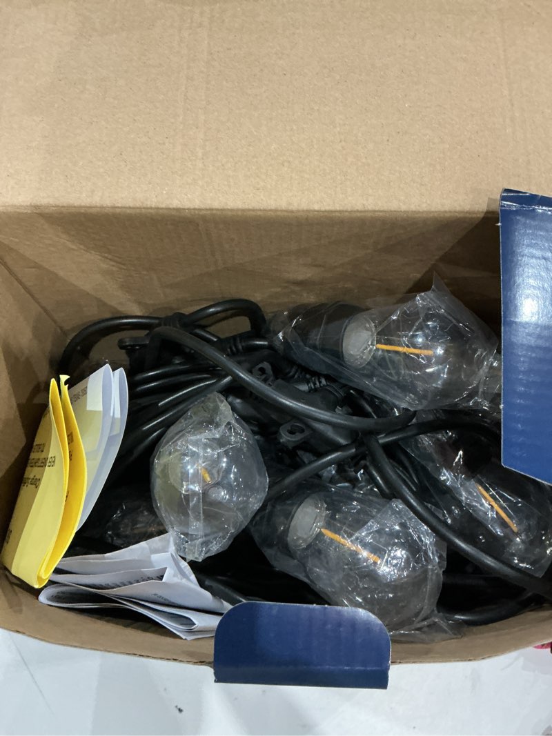 Condition photo showing As Is for harbor breeze 48-ft solar black indoor/outdoor string light with 20 white -light led edison bulbs
