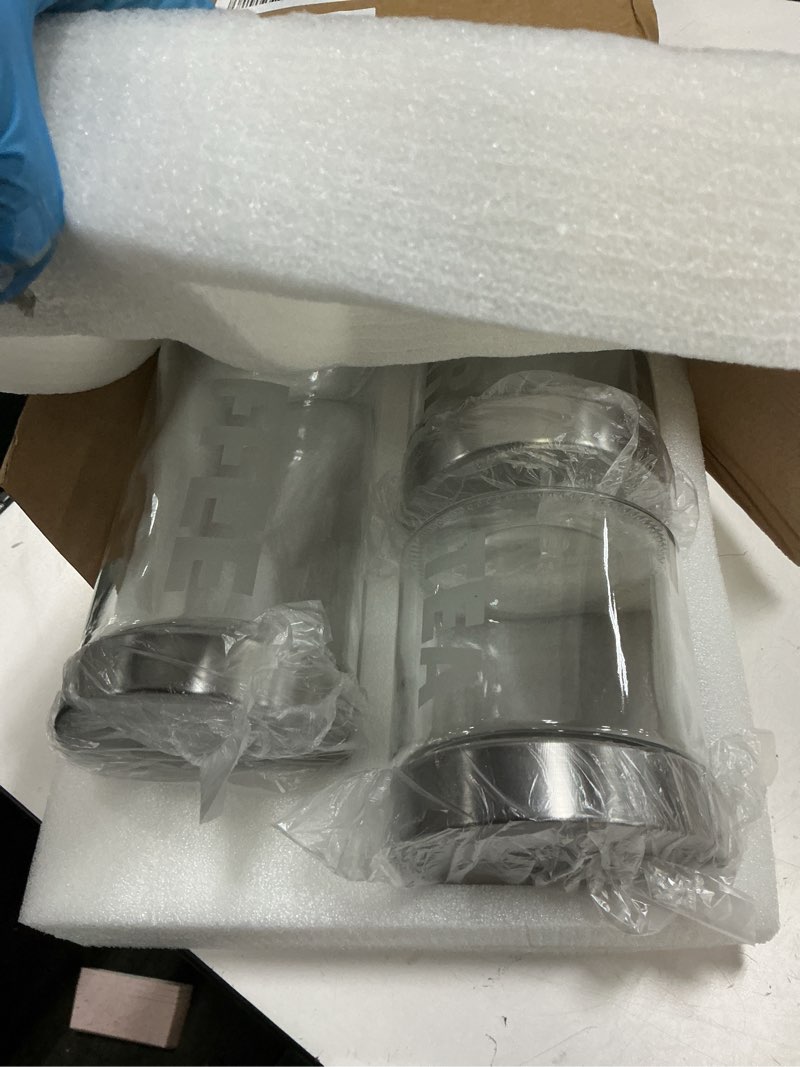 Condition photo showing Good Condition for glass canisters set of 3, 57/44/29 oz airtight storage jars with stainless steel screw lids, etched coffee/sugar/tea labels, sandblasted permanent lettering, clear pantry containers
