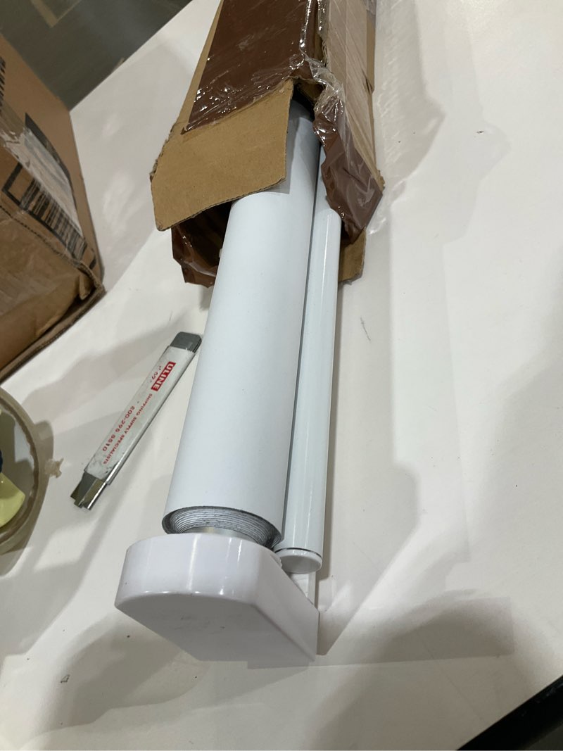 Condition photo showing As Is for LazBlinds No Tools No Drill Cordless Roller Shades, 100% Blackout Roller Blinds for Windows, Thermal Insulated UV Protection Waterproof Roll Up Window Blinds and Shades, 24'' W x 72'' H, White White 24'' W x 72'' H