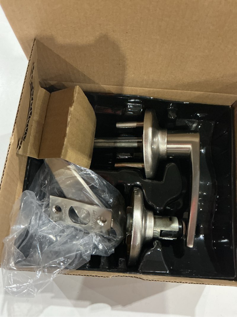 Condition photo showing As Is for delta satin nickel privacy bed/bath door handle with microban antimicrobial technology and lock