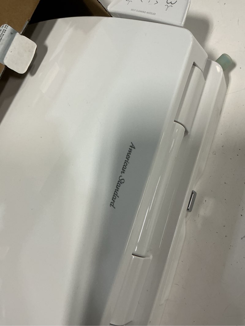 Condition photo showing As Is for American Standard 8043A60G.020 AquaWash® Essentials Non-Electric SpaLet Bidet Seat With Manual Operation, White Non-Electric - *new*